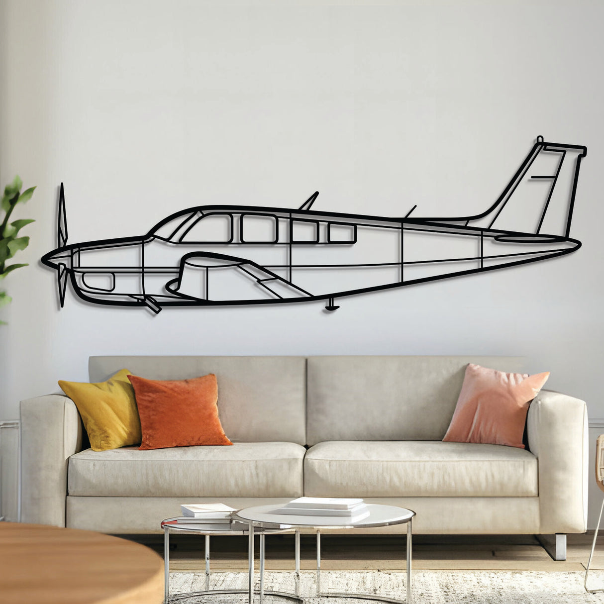 Beechcraft Bonanza A36 light aircraft silhouette — laser-cut black metal wall art with subtle floating effect