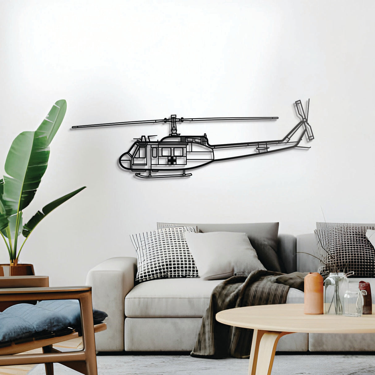 Huey wall décor – elevated slightly off the wall using spacers to create a dramatic 3D shadow effect of the Vietnam‑era medevac icon