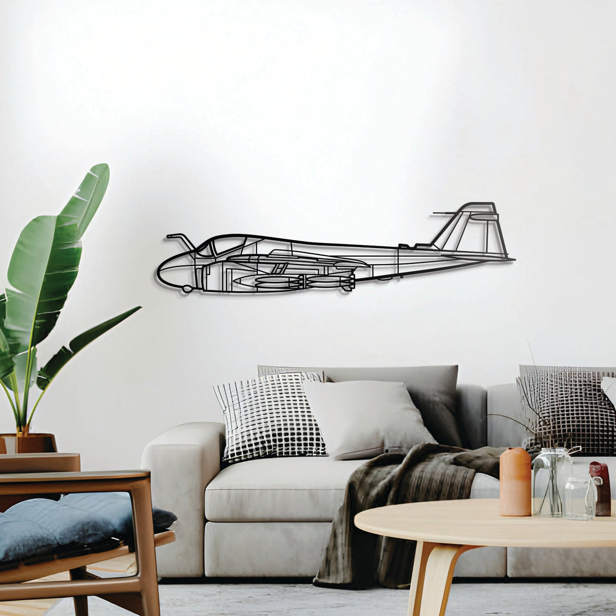Minimalist A‑6 Intruder metal art — slightly elevated off the wall for a sleek 3D look