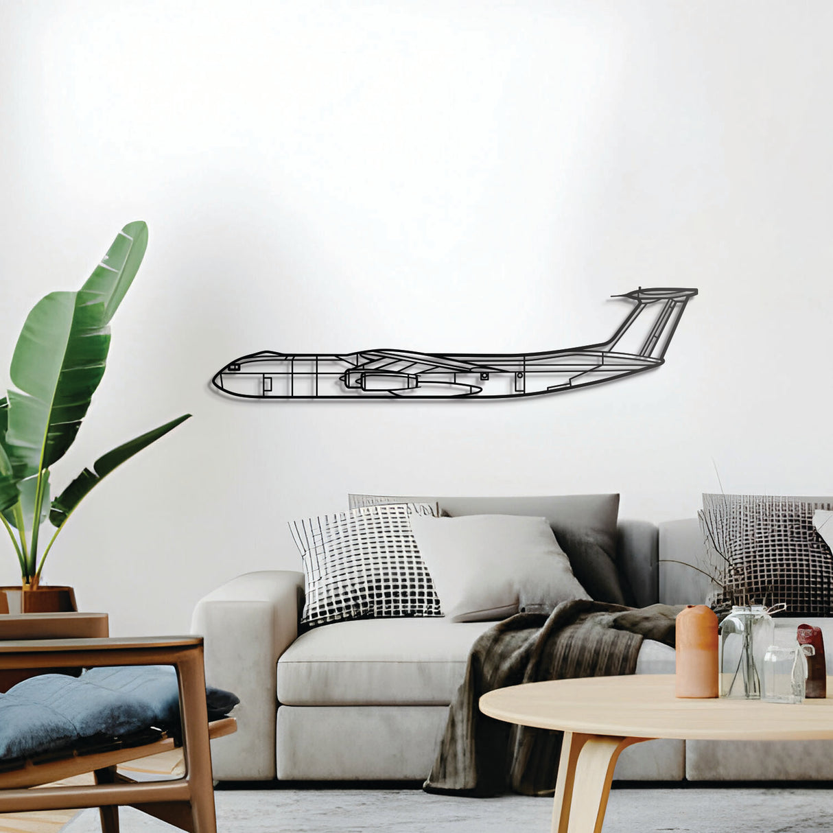 Minimalist C-141 Starlifter airplane metal wall art — elevated from wall by spacers for modern floating design