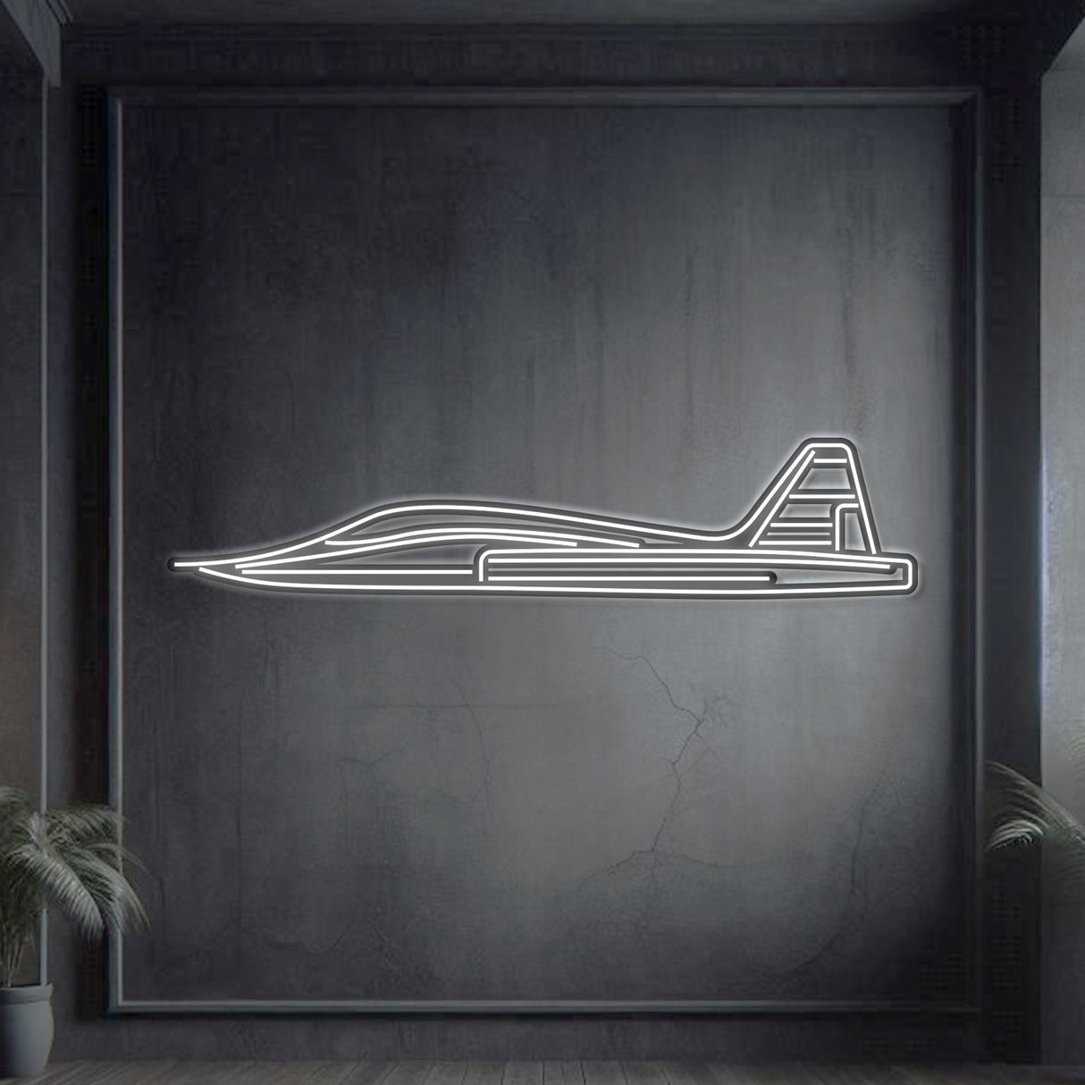 Northrop T‑38 Talon neon silhouette wall art, laser‑cut steel with glowing neon outline and dramatic 3D elevation