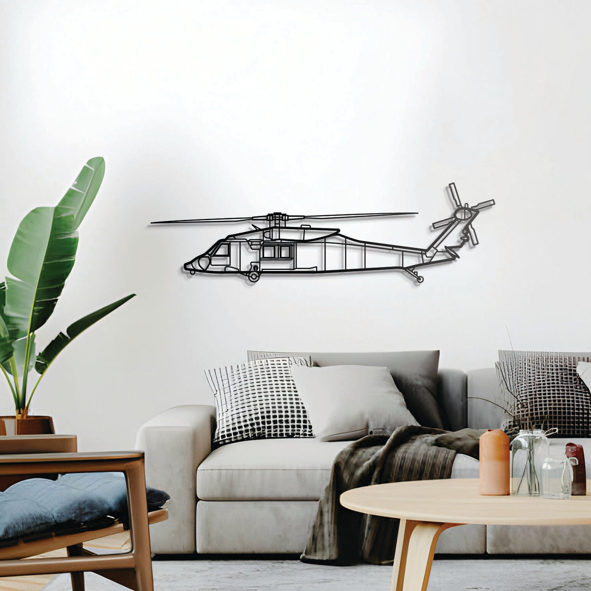 HH‑60M wall décor – elevated slightly off the wall using spacers to create a striking 3D shadow effect of its sleek twin‑rotor MEDEVAC configuration