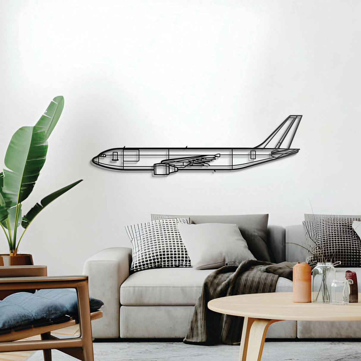 Laser-cut A300-600F steel aircraft wall décor – minimalist black cargo plane artwork for office or hangar