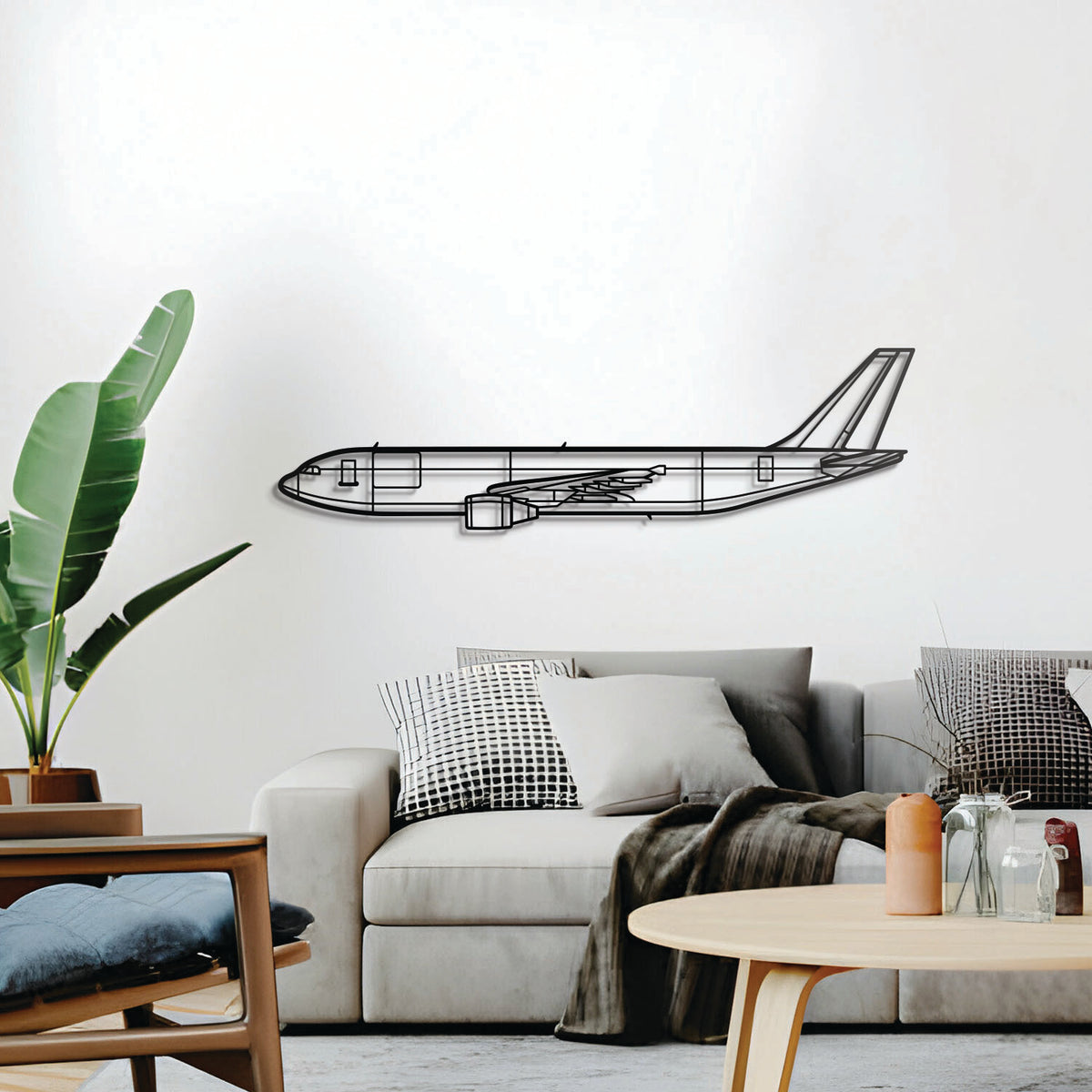 Laser-cut A300-600F steel aircraft wall décor – minimalist black cargo plane artwork for office or hangar