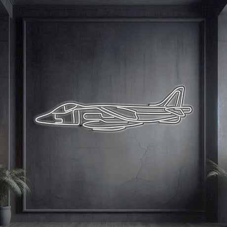 Harrier GR7 V/STOL jump jet neon silhouette wall art, laser‑cut steel with glowing neon outline and dynamic 3D elevation