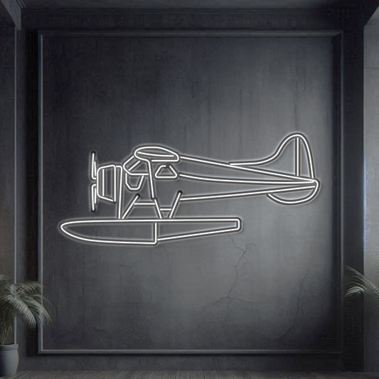 De Havilland DHC‑2 Beaver neon silhouette wall art, laser-cut steel with classic floatplane profile and sculptural 3D neon glow