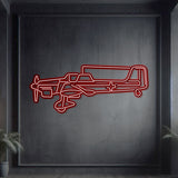 Neon-lit Stuka silhouette wall art, textured matte steel with floating neon frame for dramatic 3D depth and ambiance