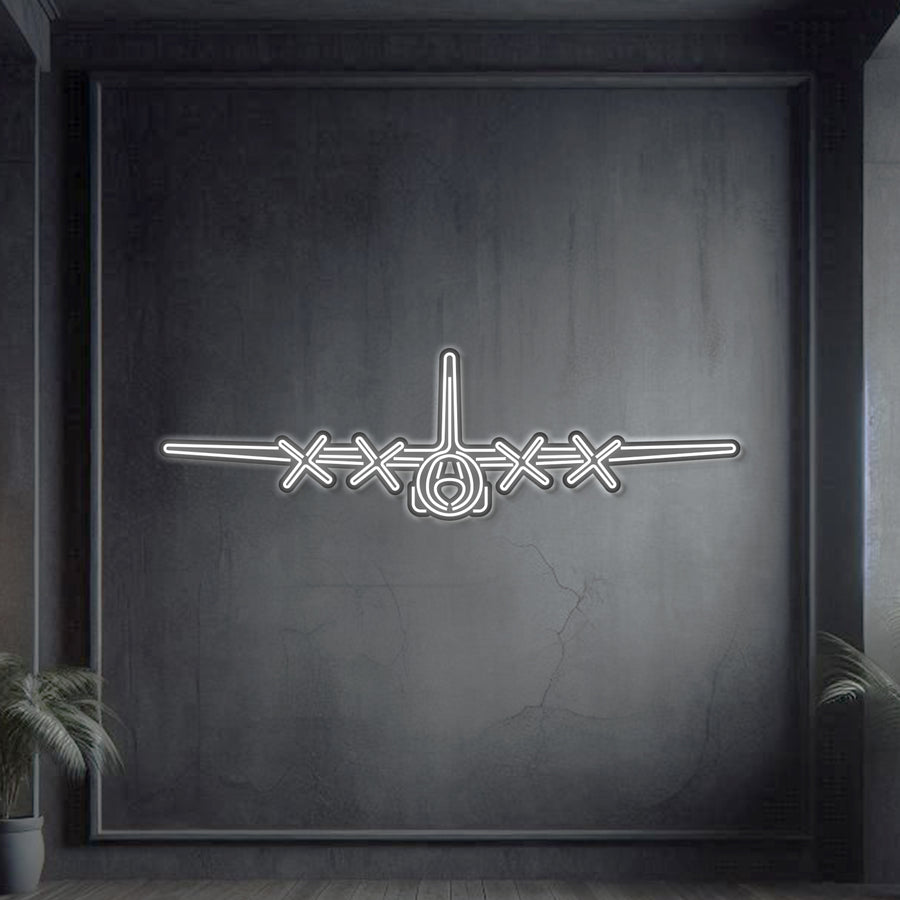 C‑130H Hercules front-view neon silhouette wall art, laser‑cut steel showcasing broad wings and quad turboprop engines in bold 3D relief