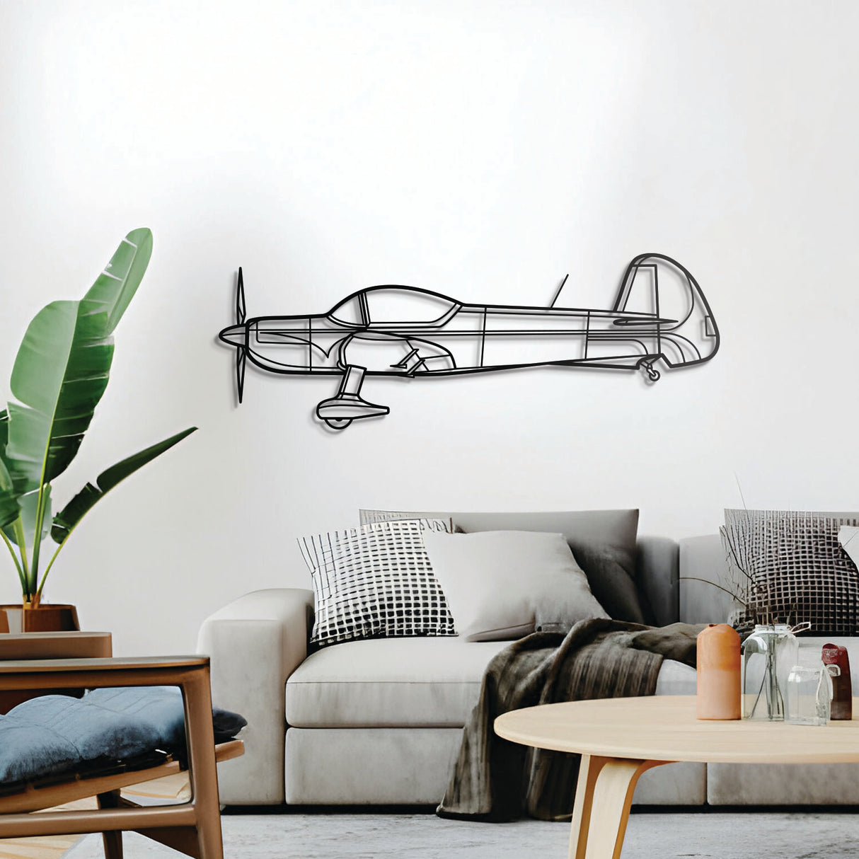 CAP 10 wall decor – elevated 1 cm off the wall with included elevation screws for a sleek 3D shadow effect of its low‑wing aerobatic profile
