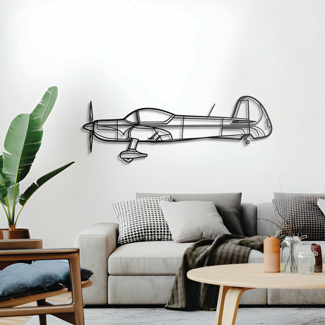 CAP 10 wall decor – elevated 1 cm off the wall with included elevation screws for a sleek 3D shadow effect of its low‑wing aerobatic profile