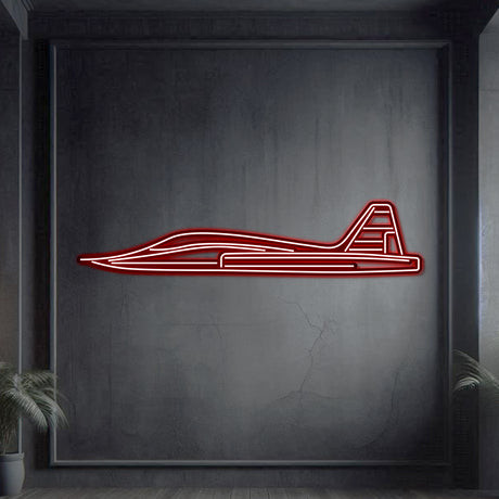 Neon‑lit T‑38 Talon silhouette wall art, textured matte steel with floating neon frame for stunning 3D depth