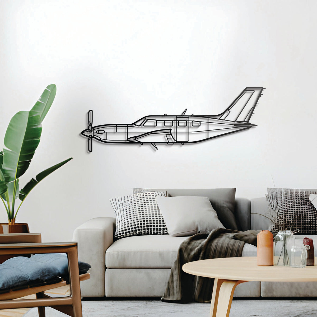 Metal Piper M600 SLS turboprop wall art – minimalist black aircraft silhouette with 1 cm wall lift and modern industrial appeal