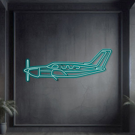Neon‑lit Piper Malibu Mirage silhouette wall art, textured matte steel with floating neon frame for dynamic 3D depth