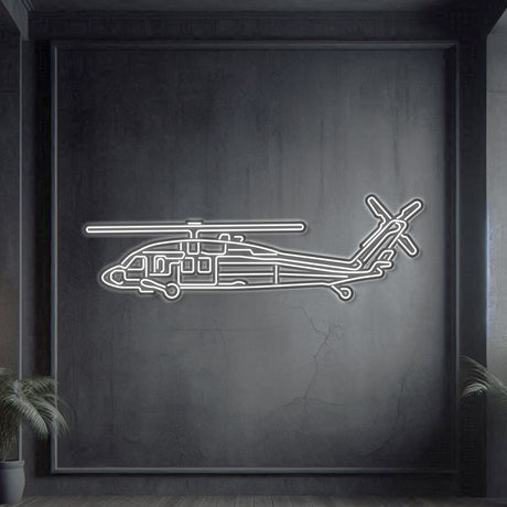 UH‑60 Black Hawk neon silhouette wall art, laser‑cut steel with vivid neon border and dramatic 3D elevation
