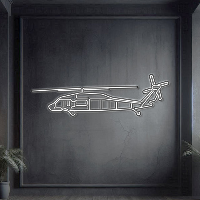 UH‑60L Black Hawk neon silhouette wall art, laser‑cut steel with vibrant neon backlighting and dramatic 3D elevation
