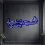 Neon-lit Van’s RV‑10 silhouette wall art, textured matte steel with floating neon frame for dramatic 3D depth